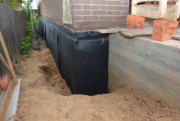 Happy homeowners after waterproofing job in Eastpointe